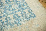 Vintage distressed Malayer runner with soft blue Herati pattern meeting the light beige border.