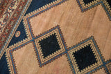 Malayer rug: unusual diamond patterns, intricate geometric delineation, pale blue, faded red, and worn pile.