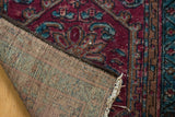 Hand-knotted reverse and raspberry red pile with sapphire blue Lilihan patterns.