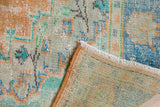 Faded tangerine, mint Oushak pile showing wear, exposed foundation, reverse, and fringe.