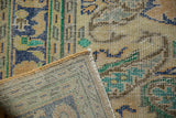 Vintage Distressed Oushak carpet pile showing mostly even wear, faint foundation, and tight reverse.
