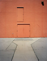 Joe Farrell contemporary photograph: 'Three Doors' on a salmon brick wall and concrete.