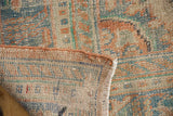 Distressed vintage Oushak rug texture, showing even wear, secured side, and foundation.