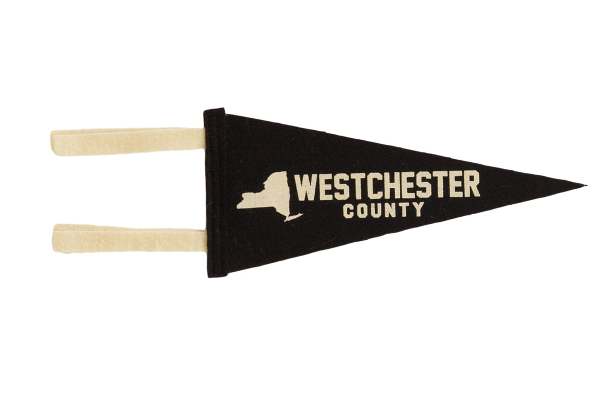 Westchester County black felt pennant with a cream graphic of New York State.