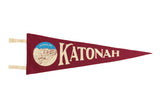 Crimson red Katonah NY felt pennant with Katonah Avenue street scene graphic, 9x27 inches.