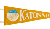 Close-up of the Katonah Ave. town illustration on the golden yellow wool felt pennant.