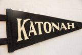 Close-up of the Katonah pennant's black wool felt and textured cream lettering.