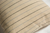Textured natural silk fabric pillow with delicate dark grey and light blue stripes.