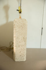 Vintage ceramic lamp showing the textured travertine finish and original power cord.