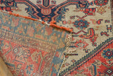 Antique Malayer rug runner: hand-knotted construction, worn pile, exposed foundation, orange edge.
