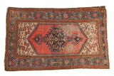 Vintage Kurdish Malayer rug with blush red stepped medallion, Herati fill, blue serpents, visible wear, 3'4
