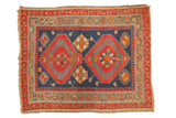 Antique Caucasian hand-knotted rug with indigo, tomato red medallions, field blossoms, tattered edges, 4x5.