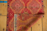Hand-knotted foundation, secured edge, and low pile on the geometric Yastik rug.
