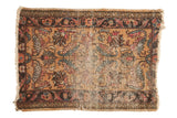 Antique Persian Lilihan rug mat with faded floral medallion, beige field, and muted floral motifs.