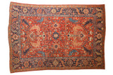 Antique Heriz carpet with saturated cherry red field and geometric allover design, 6'11
