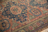 Intricate floral motifs and exposed foundation on a hand woven Caucasian Soumac carpet.