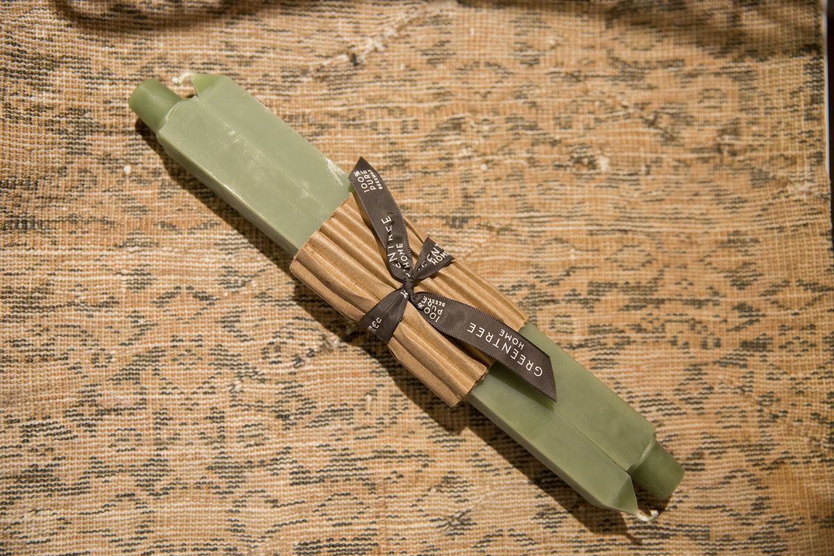 Pair of sage green square beeswax taper candles, tied with a Greentree Home ribbon.