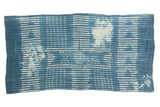 Vintage Batik indigo African textile throw with white geometric resist-dyed patterns.