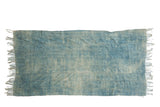 Collectible hand-woven African textile throw, variegated denim indigo with stitched panels.