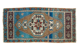Hand-knotted distressed Oushak rug mat with aqua blue, earthen bronze medallion, colorful abrashes.