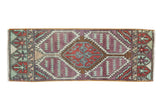 Distressed vintage Oushak rug mat with aubergine, rust, and mint geometric medallion. 1'2
