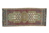 Hand-knotted distressed Oushak runner, aubergine field, elongated geometric medallion, 1'4