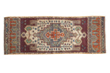 Distressed vintage Oushak rug runner, oversized concentric geometric medallions, wine aubergine and antique ivory.