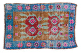 Vintage distressed Oushak rug with geometric copper, plum, sky blue florals and starburst border, 2'1