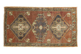 Vintage distressed Oushak mat with rust, mint, and oxidized silver geometric medallions, 1'8