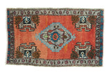 Distressed Oushak rug, central medallion, brick red field, potted planters, grey border, 1'11