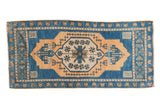 Decorative distressed vintage Oushak runner, aqua blue field with sand and peach medallion. 1'9