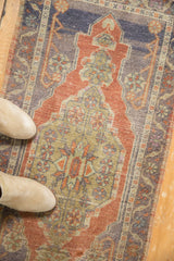 Vintage Distressed Oushak rug with soft patina, rust field, and pale gold curvilinear medallion.