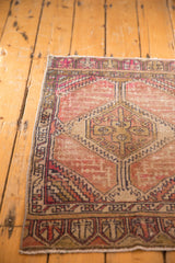 Distressed Oushak rug medallion with geometric design and faint foundation.