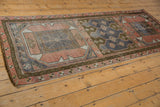 Oushak runner's primitive geometric panel with time-softened blush, denim blue, olive green.