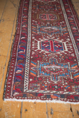 Repeating geometric hook and latch medallions on vintage Karaja runner.