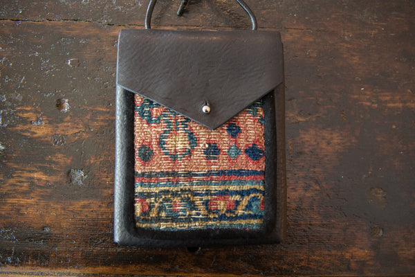 Rug Fragment and Leather Shoulder Bag