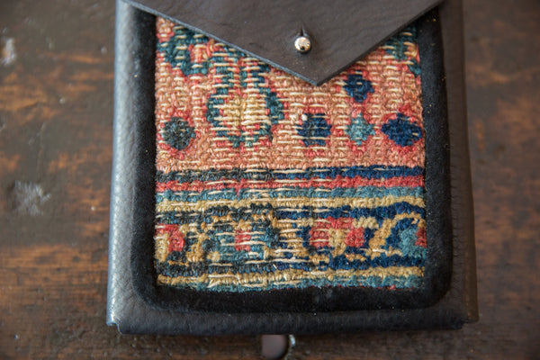 Rug Fragment and Leather Shoulder Bag