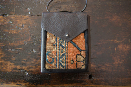 Rug Fragment and Leather Shoulder Bag