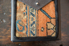 Rug Fragment and Leather Shoulder Bag