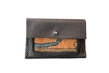 Dainty Rug Fragment Wallet, vegetable tanned leather with orange and teal woven pattern.