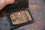 Dainty Rug Fragment Wallet interior, beige, blue, brown geometric woven pattern with metal snap.