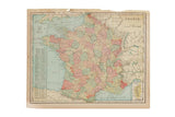Detailed 1907 Cram's map of France, pastel regions on aged paper.