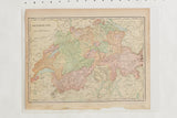 Cram's 1907 vintage map of Switzerland, with colorful regions and aged edges.
