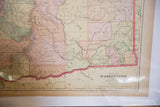 1907 Cram's Washington map lower right, publisher info, page 107, and faded counties.