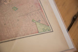 Prospect Park detail on aged cream paper of a 1907 New York City map.