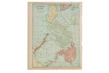 Aged Cram's 1907 Map of Philippine Islands, showing green, blue, and coral landmasses.