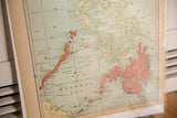 Angled view of 1907 Philippine map, highlighting reddish Mindanao, Jolo Sea, and page 110.