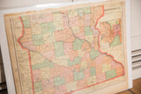 Central and eastern counties of the 1907 Minnesota map, with pastel colors and paper discoloration.