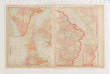 Open 1907 Cram's Atlas pages showing Michigan and Tennessee maps with pastel tones.