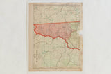 Cram's vintage map of New Hampshire, showing red state border and worn right edge.